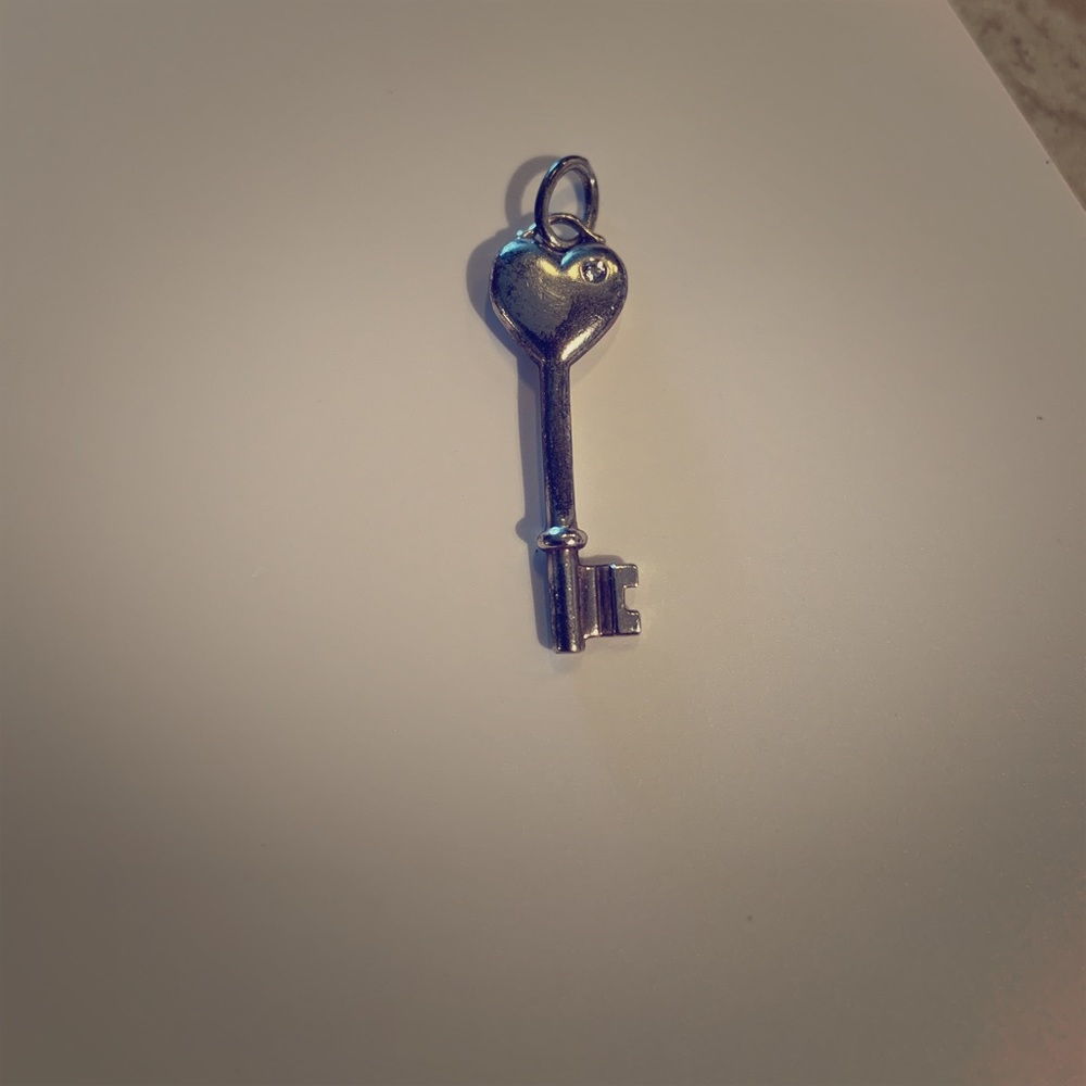 Retired Tiffany & Co key charm with diamond!